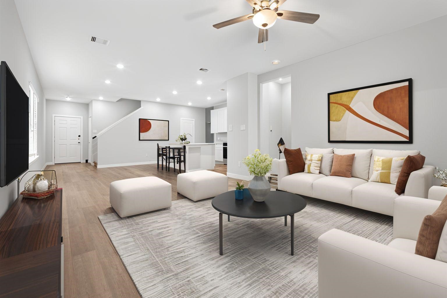 3922 Accolade Crossing Brookshire, TX 77423 - Photo 22 of 27 a living room with furniture and kitchen view