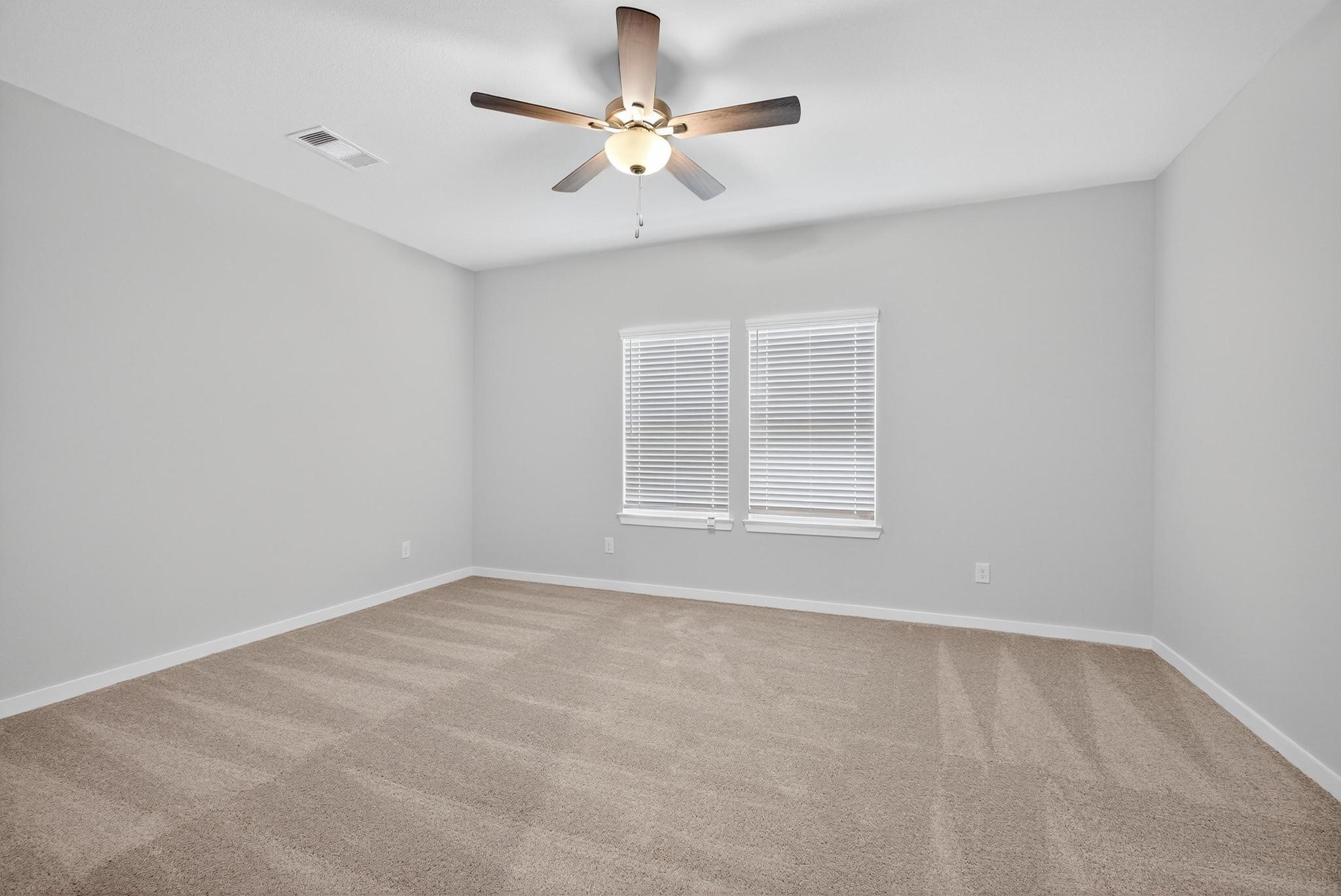 3922 Accolade Crossing Brookshire, TX 77423 - Photo 10 of 27 a view of an empty room with a window