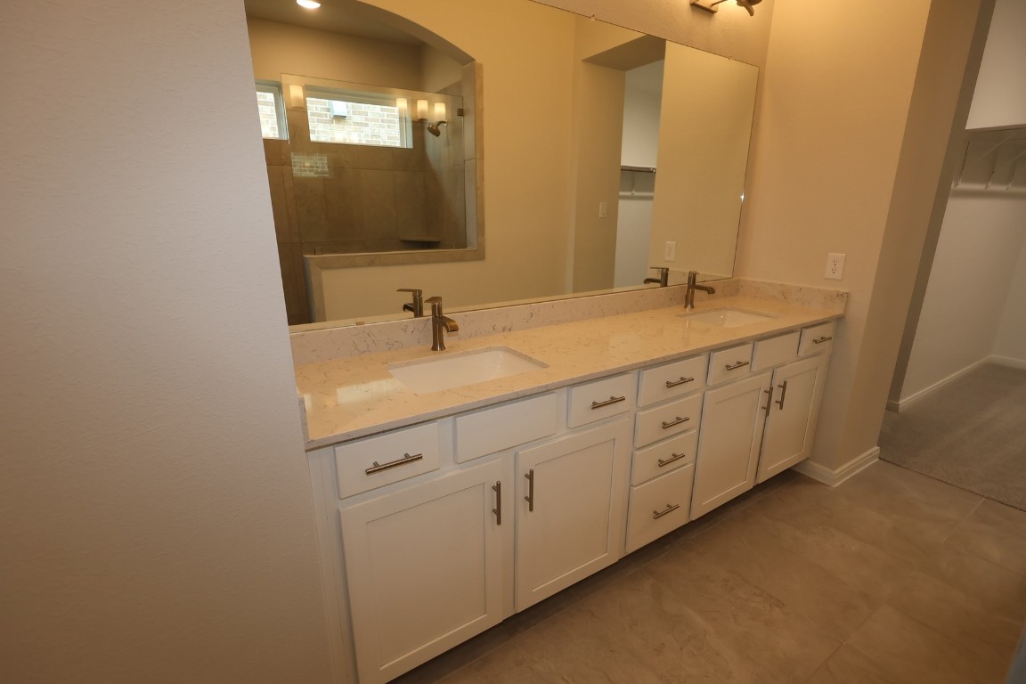 110 Afton June Drive Rosenberg, TX 77471 - Photo 12 of 19 a bathroom with 2 sink and a mirror
