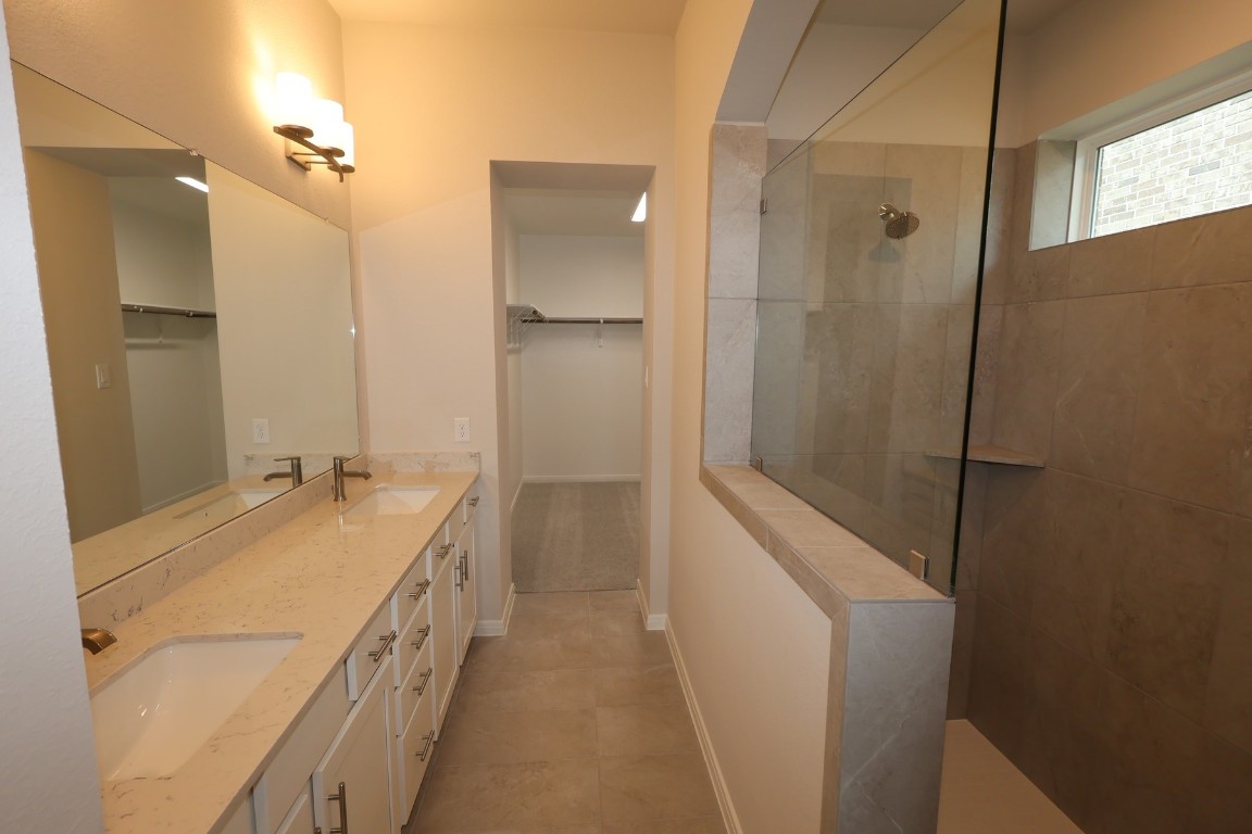 110 Afton June Drive Rosenberg, TX 77471 - Photo 13 of 19 a bathroom with a tub sink shower and mirror