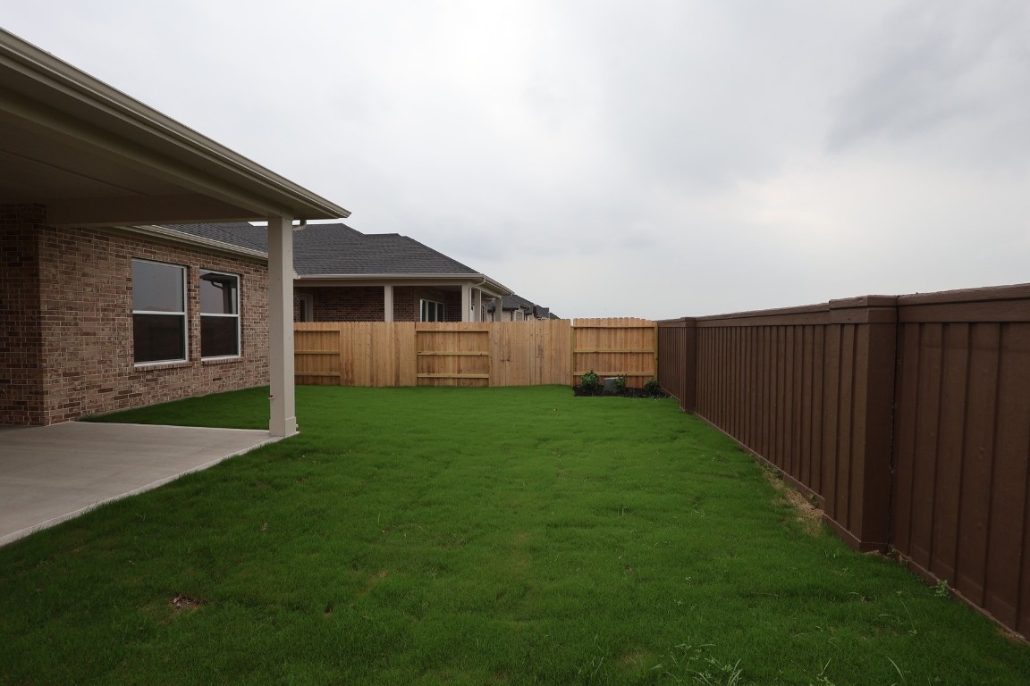 110 Afton June Drive Rosenberg, TX 77471 - Photo 3 of 19 a view of a backyard with wooden fence