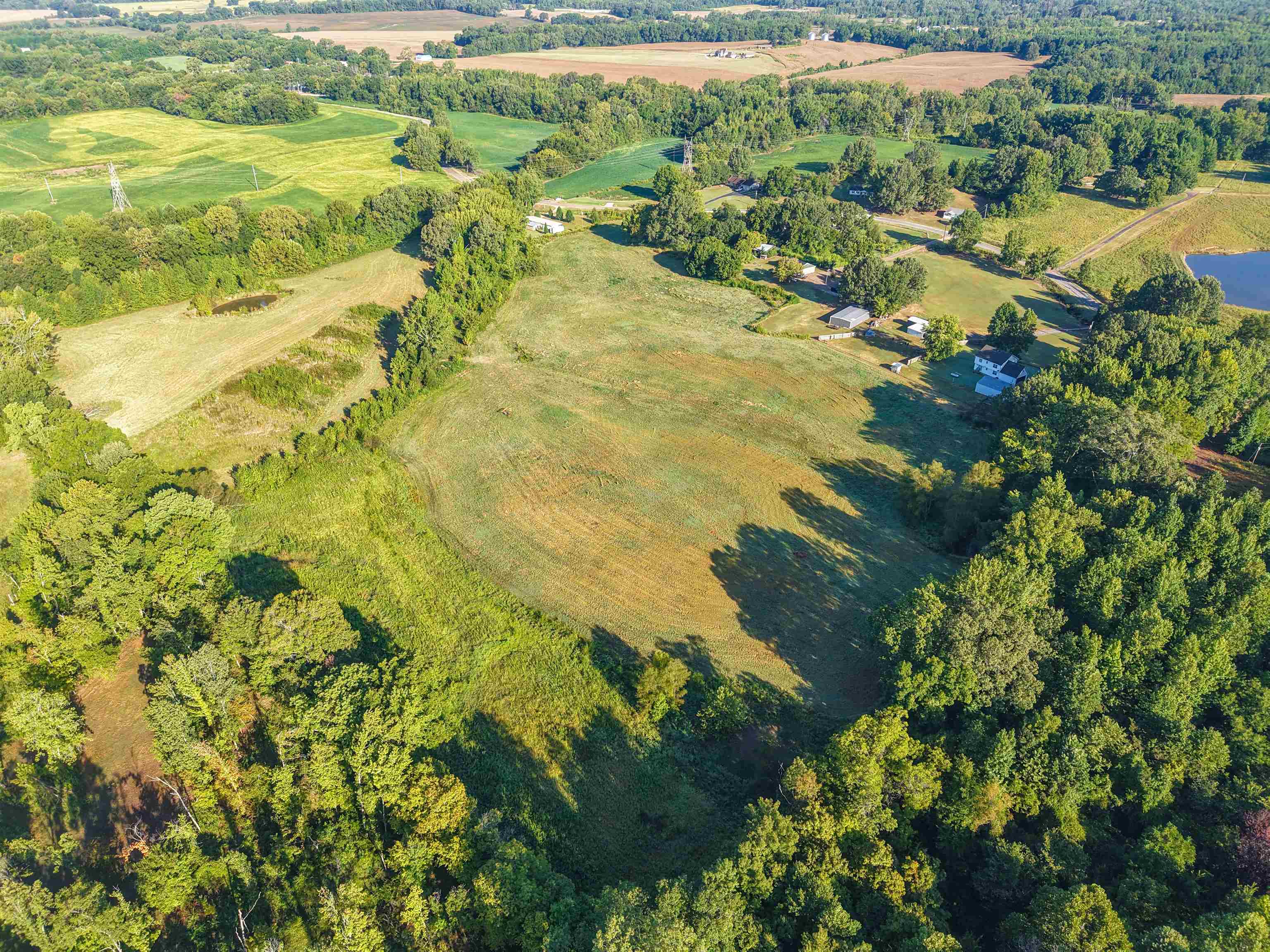 0 Bluebird Hill Road Ripley, TN 38063 - Photo 2 of 17 a view of a lake with a houses