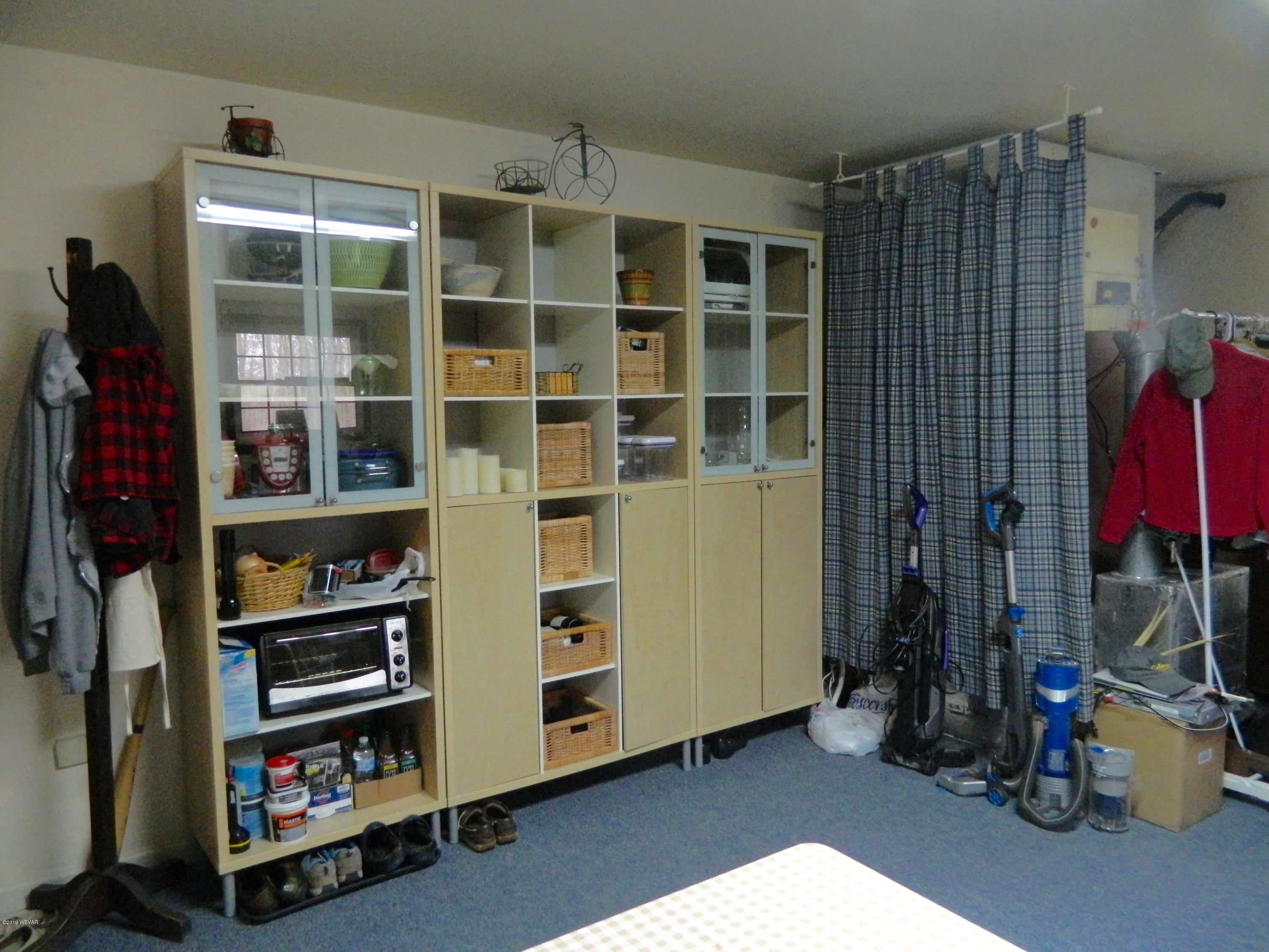 288 Rock Ledge Road Dushore, PA 18614 - Photo 30 of 42 Utility Room Sheelving