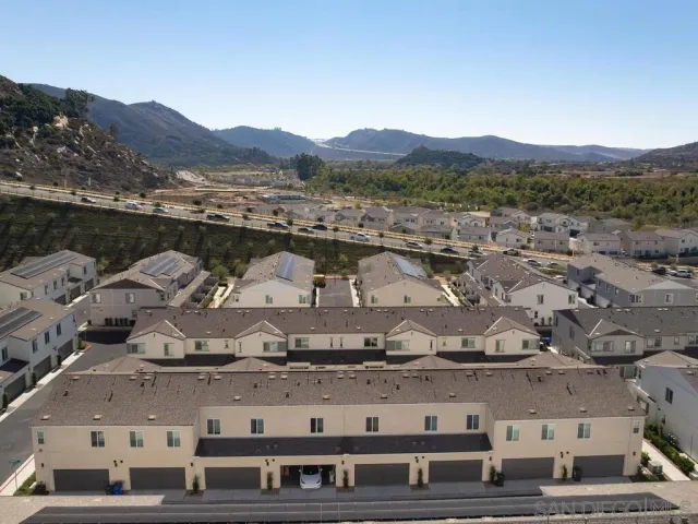 a view of a city with mountain