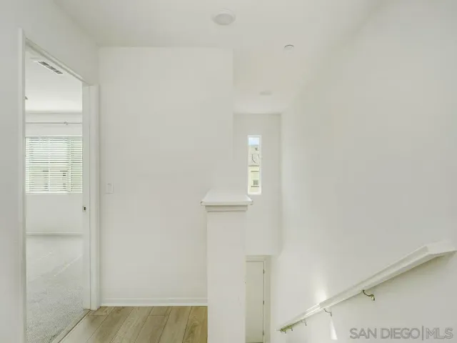 a view of hallway with shower