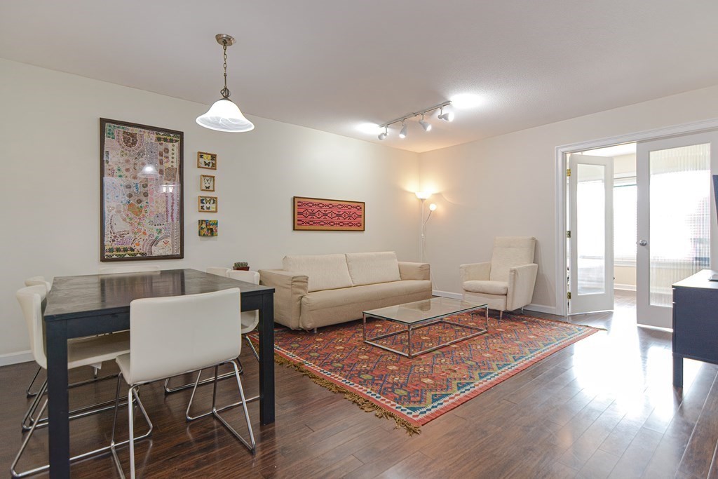59 Brainerd Road, Unit 410 Boston, MA 02134 - Photo 12 of 41 a living room with furniture and wooden floor