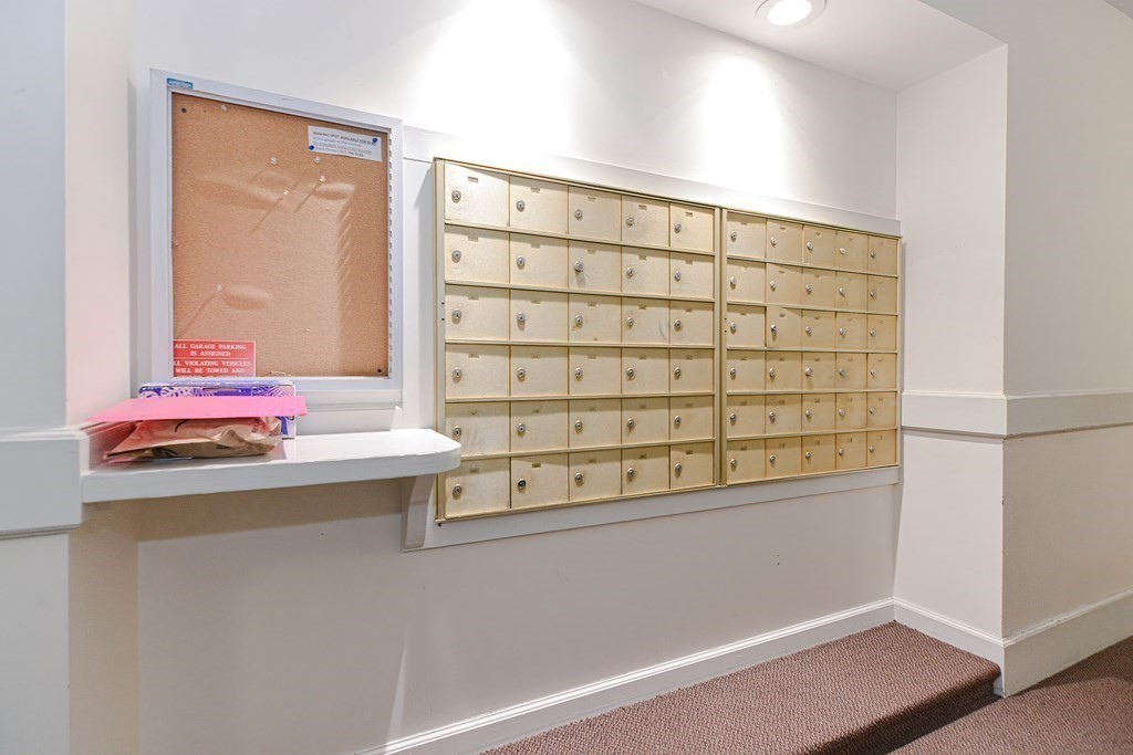 59 Brainerd Road, Unit 410 Boston, MA 02134 - Photo 32 of 41 a utility room with washer and dryer