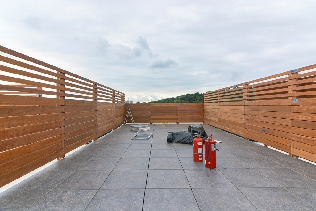 59 Brainerd Road, Unit 410 Boston, MA 02134 - Photo 36 of 41 a view of terrace with seating space