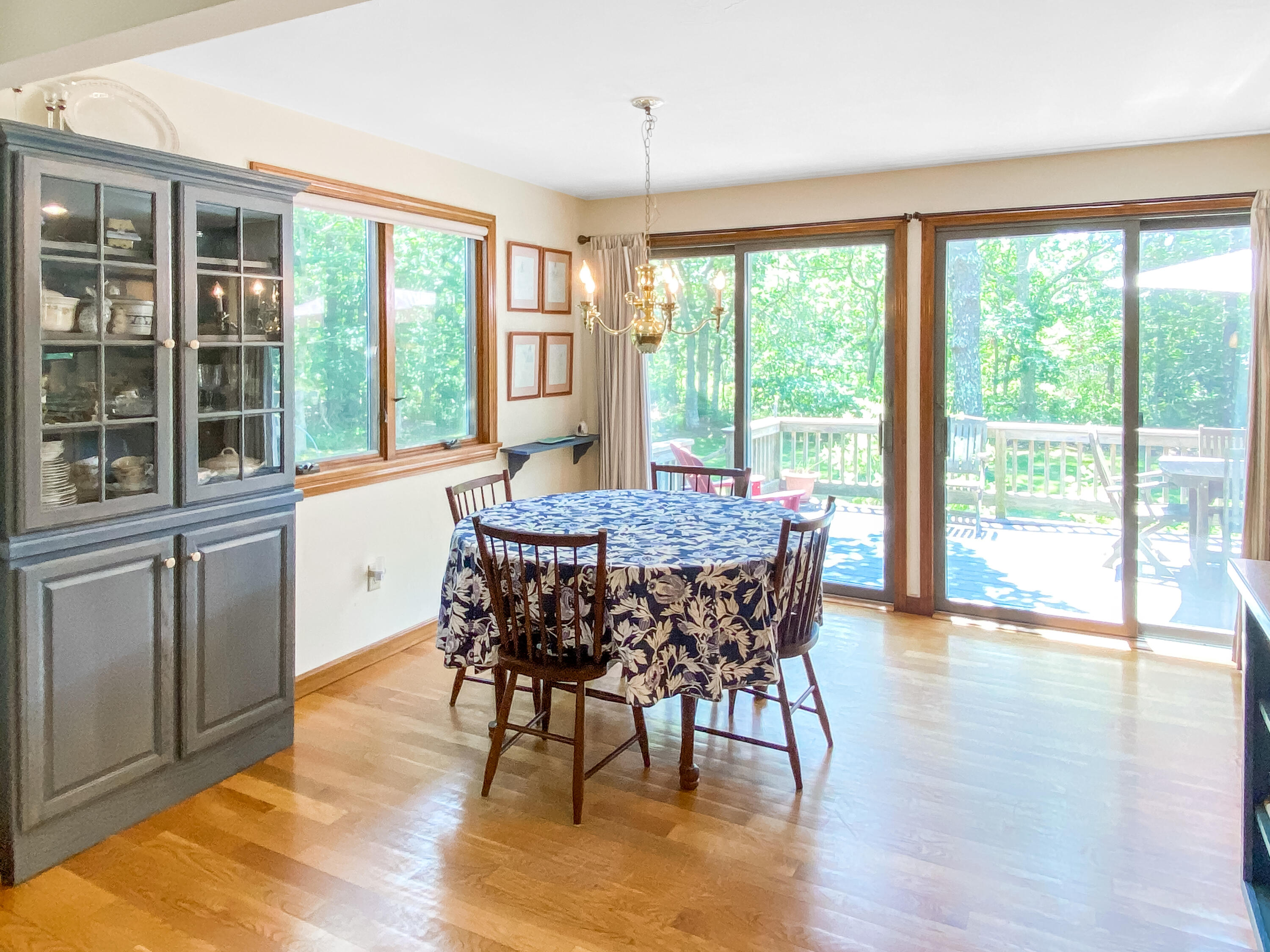54 Marthas Road Edgartown, MA 02539 - Photo 13 of 30 a view of a dining room with furniture window and wooden floor