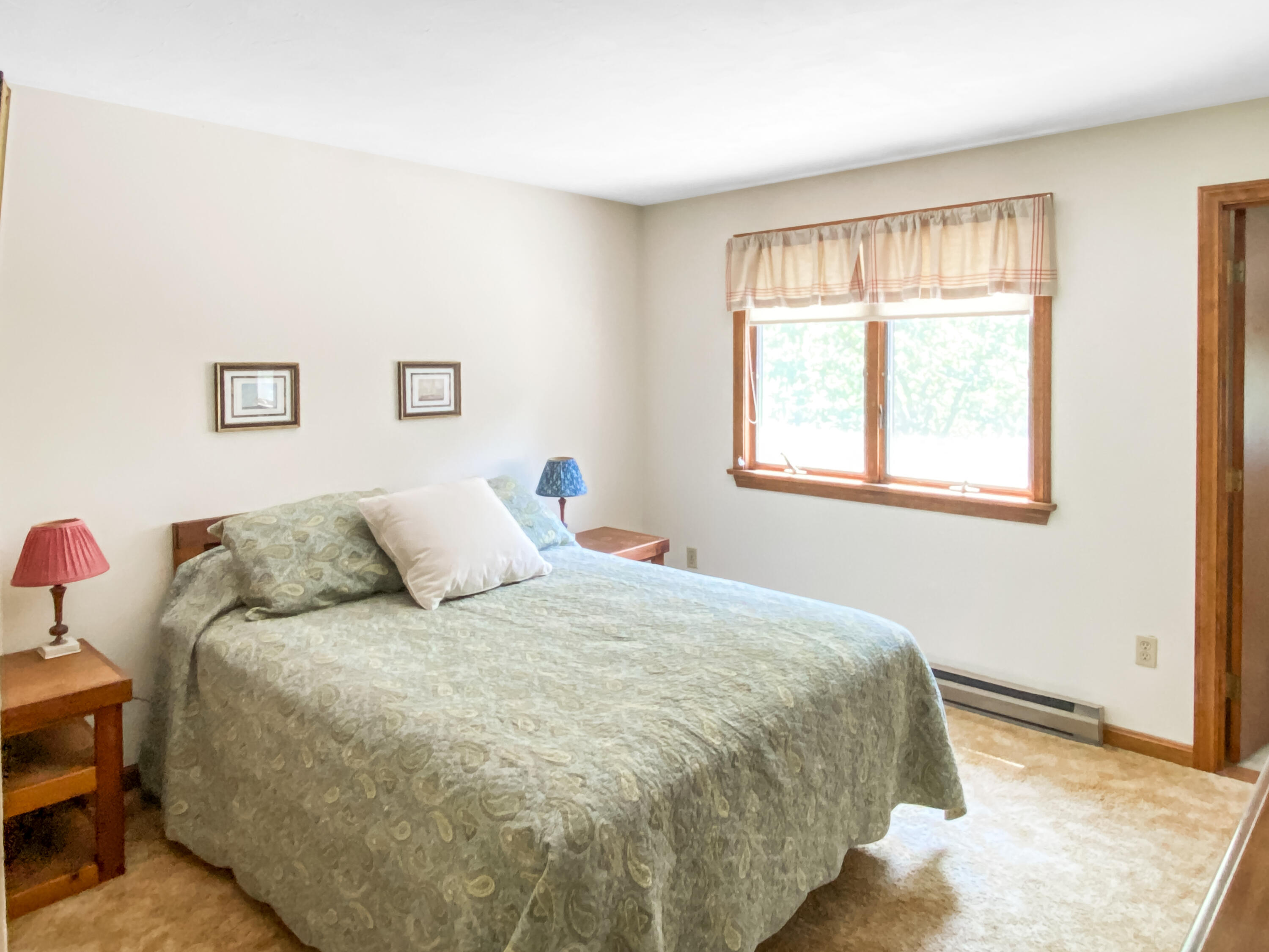 54 Marthas Road Edgartown, MA 02539 - Photo 21 of 30 a bedroom with a bed and a window