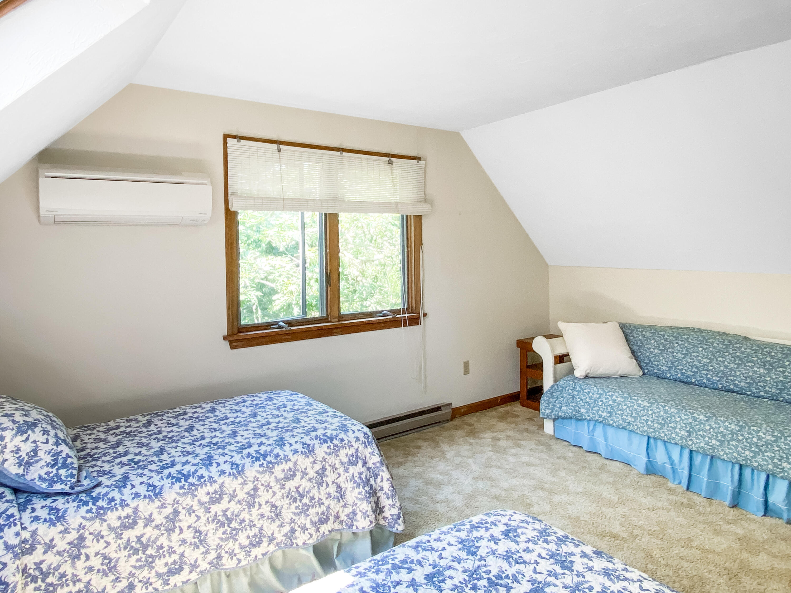 54 Marthas Road Edgartown, MA 02539 - Photo 25 of 30 a bedroom with a bed and a window