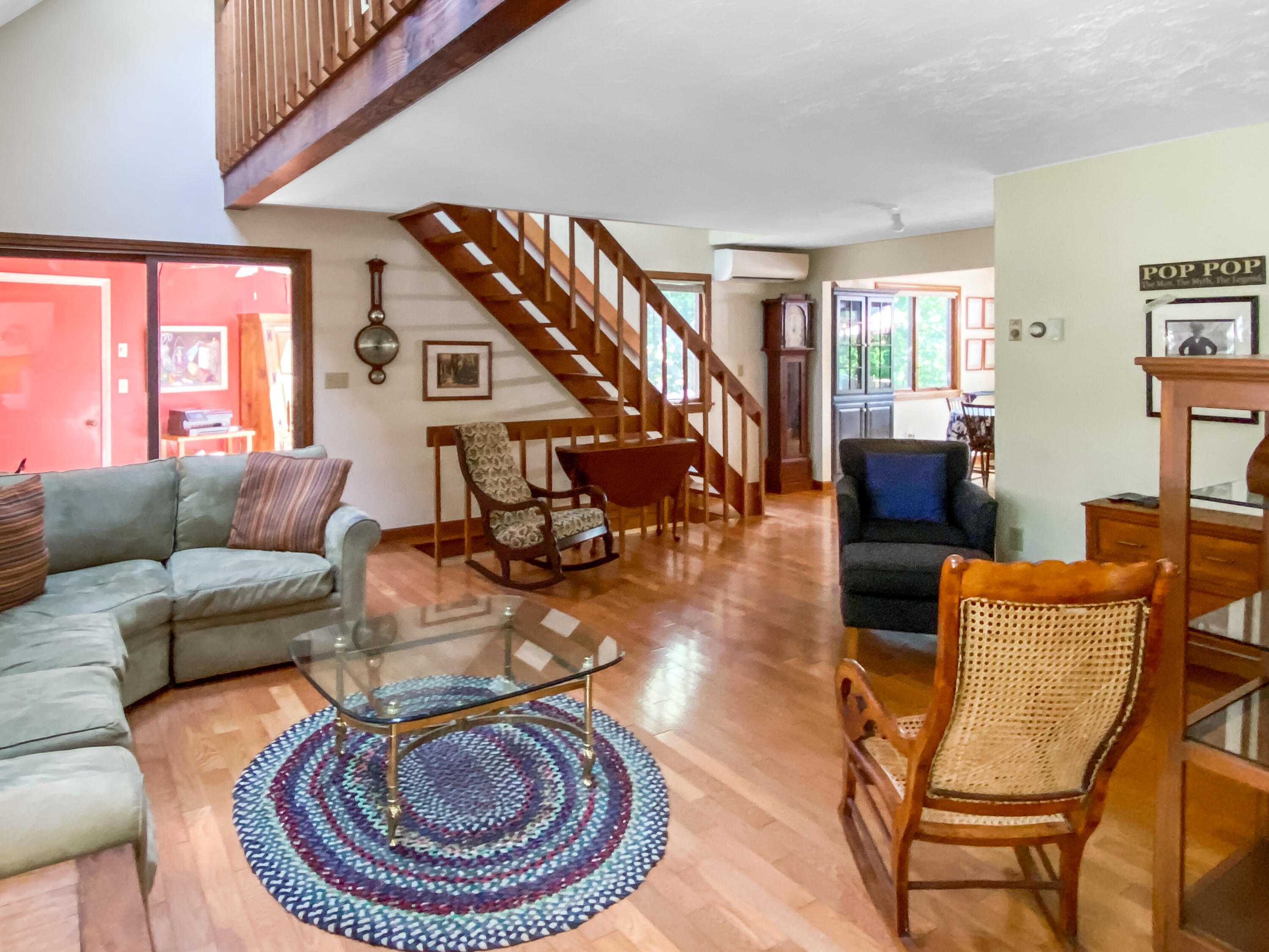 54 Marthas Road Edgartown, MA 02539 - Photo 7 of 30 a living room with furniture a rug and a window