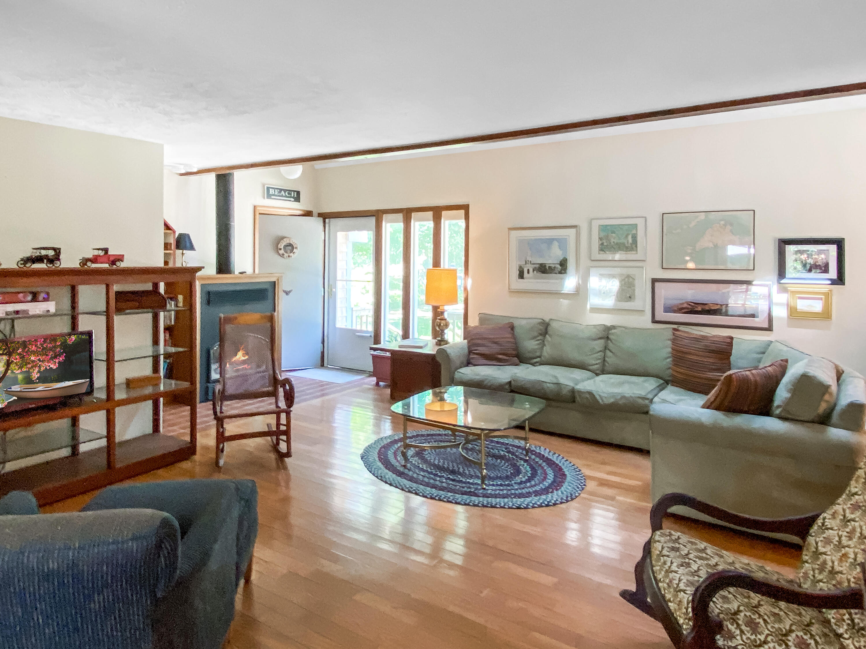 54 Marthas Road Edgartown, MA 02539 - Photo 8 of 30 a living room with furniture and a table