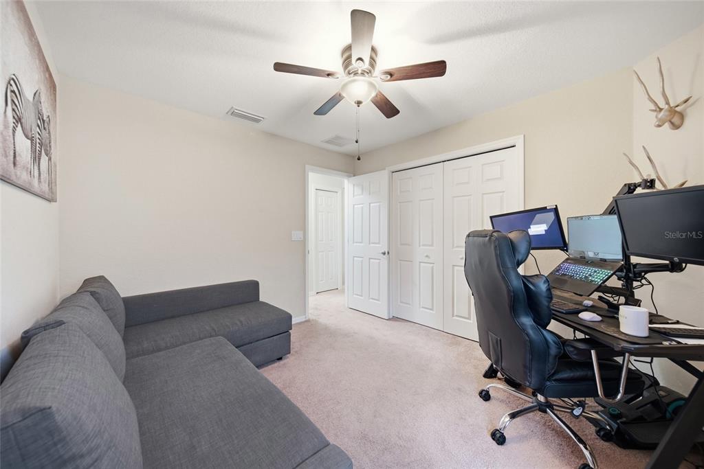4066 Sundance Pl Loop Mulberry, FL 33860 - Photo 14 of 28 a living room with furniture