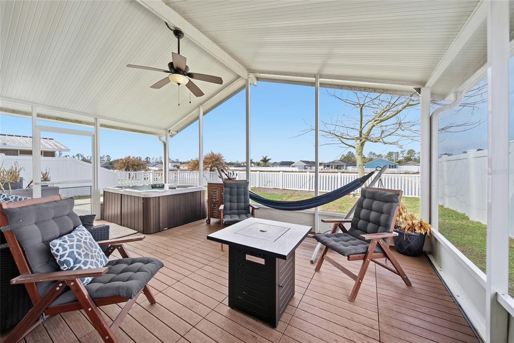 4066 Sundance Pl Loop Mulberry, FL 33860 - Photo 20 of 28 a room with wooden floor pool table and chairs