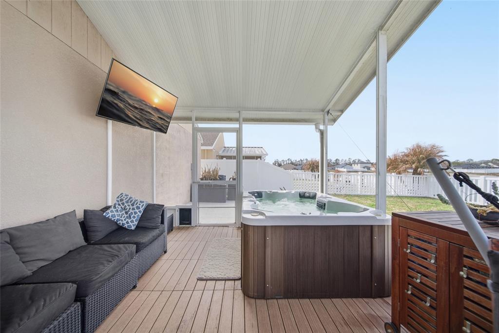 4066 Sundance Pl Loop Mulberry, FL 33860 - Photo 21 of 28 a living room with a couch and a table