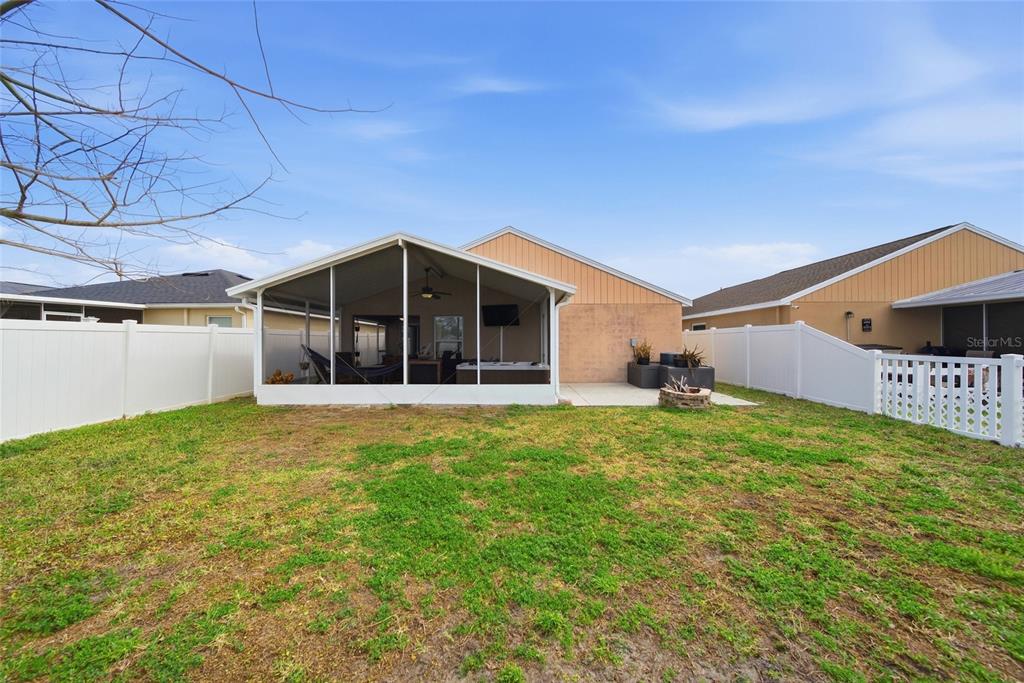 4066 Sundance Pl Loop Mulberry, FL 33860 - Photo 24 of 28 a view of a backyard