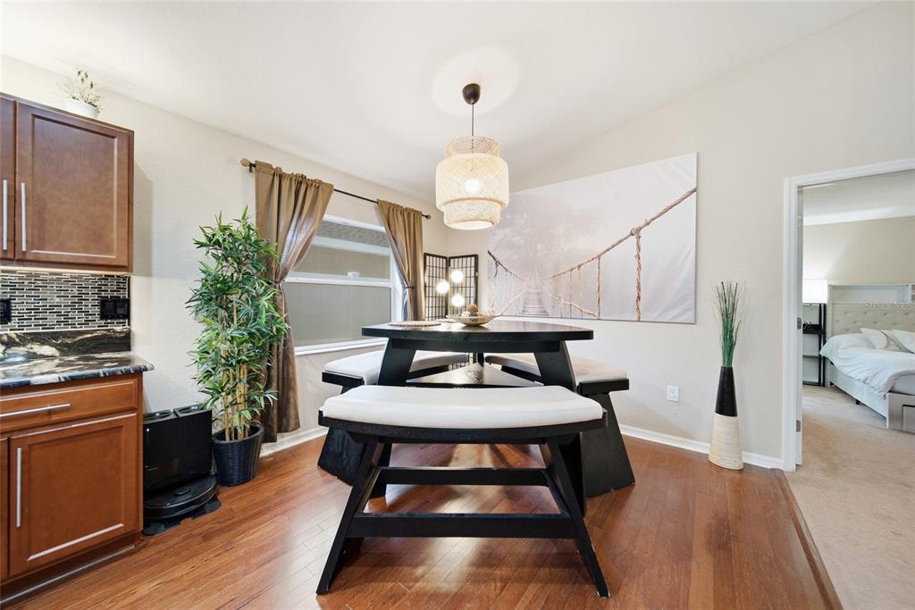 4066 Sundance Pl Loop Mulberry, FL 33860 - Photo 6 of 28 a living room with furniture and a large window