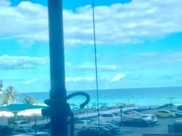 a bed room with a bed and a window