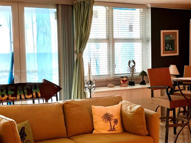 a living room with furniture and a couch