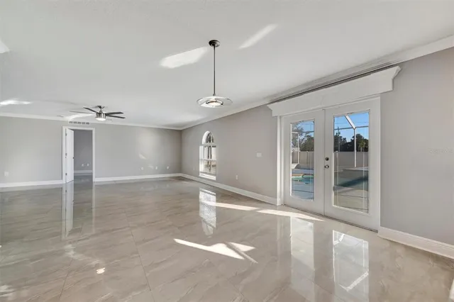 a bathroom with a bathtub and a window