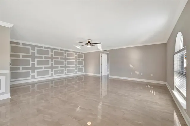 a bathroom with a bathtub a mirror a double vanity sink and vanity