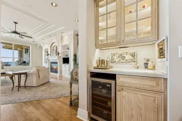 a living room with granite countertop furniture and fireplace
