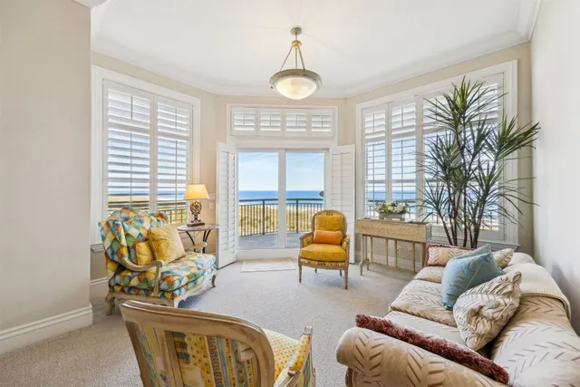a spacious bathroom with a granite countertop sink mirror and bathtub