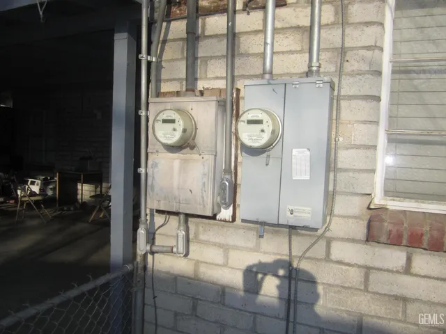 a area with wooden floor and a clock on it