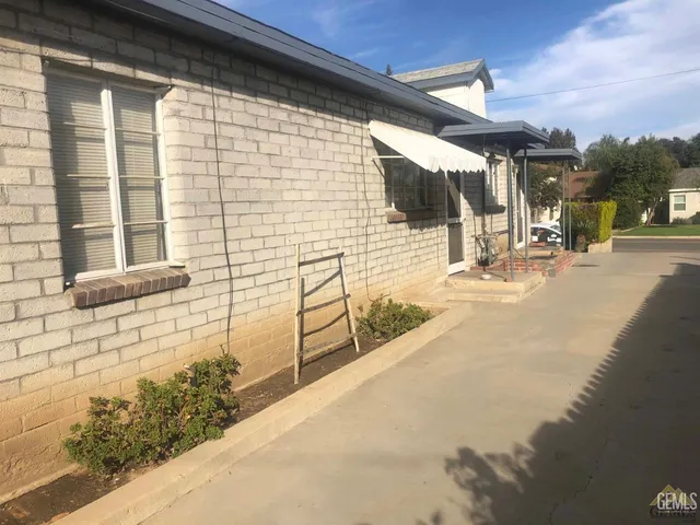 a view of a pathway with a building in the background