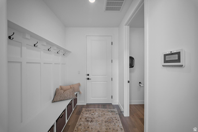 382 North Rhyolite Drive, Unit 111 Hurricane, UT 84737 - Photo 6 of 37 Entryway featuring built-in wainscoting with coat hooks and integrated bench seating with storage cubbies