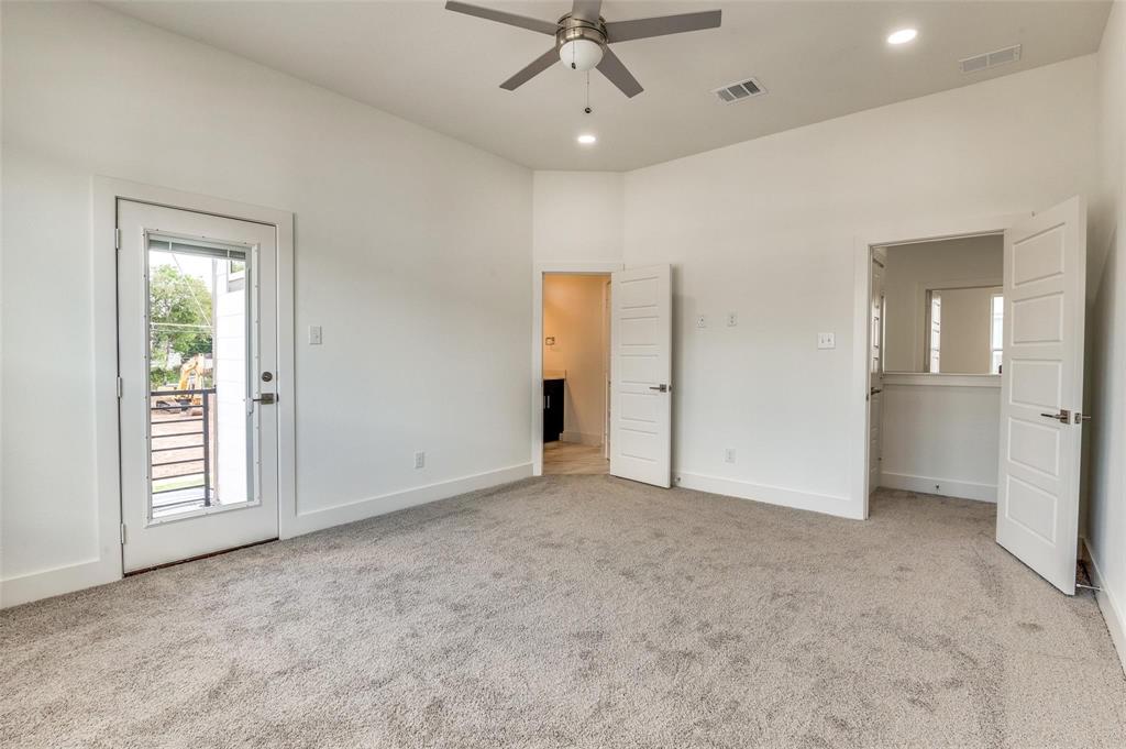 7307 Rubio Place Dallas, TX 75235 - Photo 11 of 17 an empty room with closet and a ceiling fan