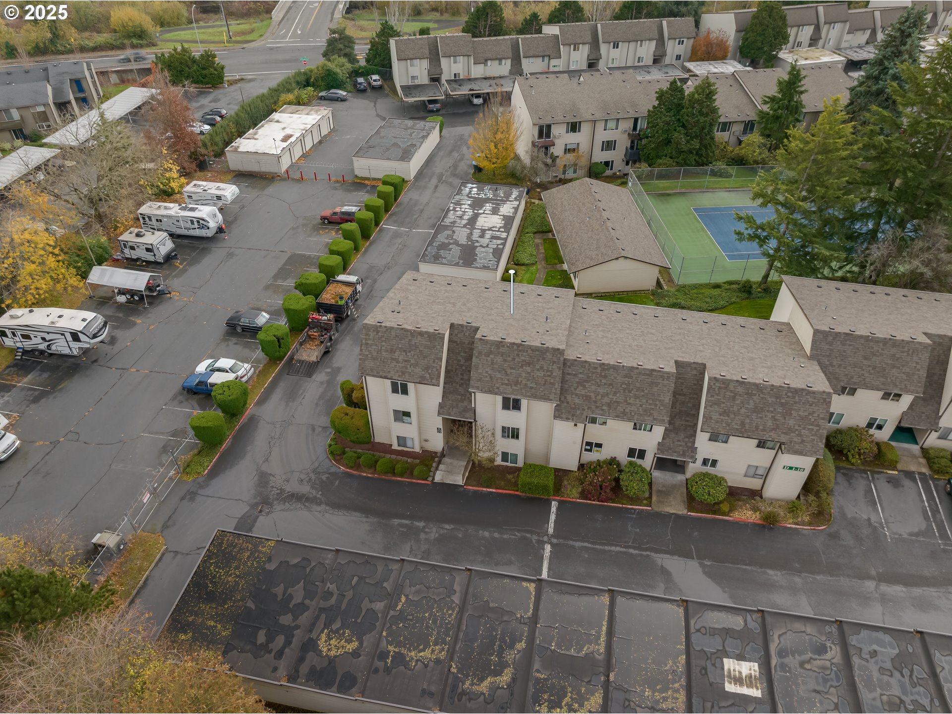 200 Southwest Florence Avenue, Unit D12 Gresham, OR 97080 - Photo 17 of 24 an aerial view of multiple houses with yard