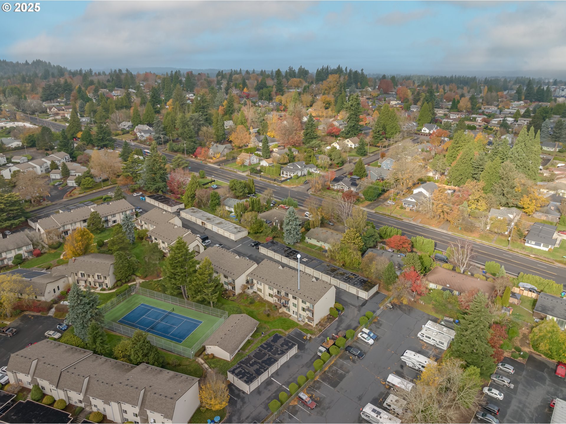 200 Southwest Florence Avenue, Unit D12 Gresham, OR 97080 - Photo 19 of 24 an aerial view of residential houses with outdoor space
