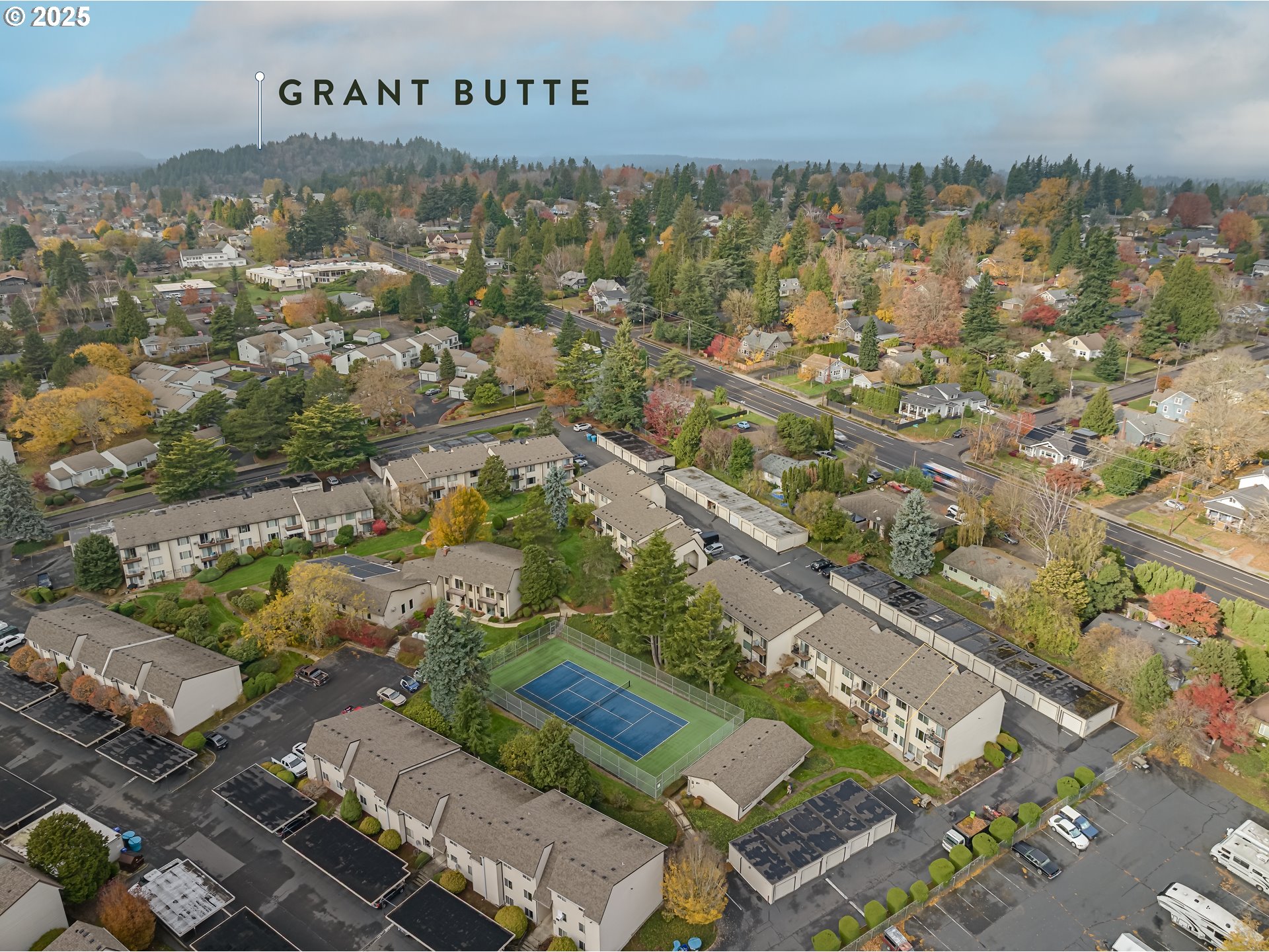 200 Southwest Florence Avenue, Unit D12 Gresham, OR 97080 - Photo 20 of 24 an aerial view of residential building and parking space