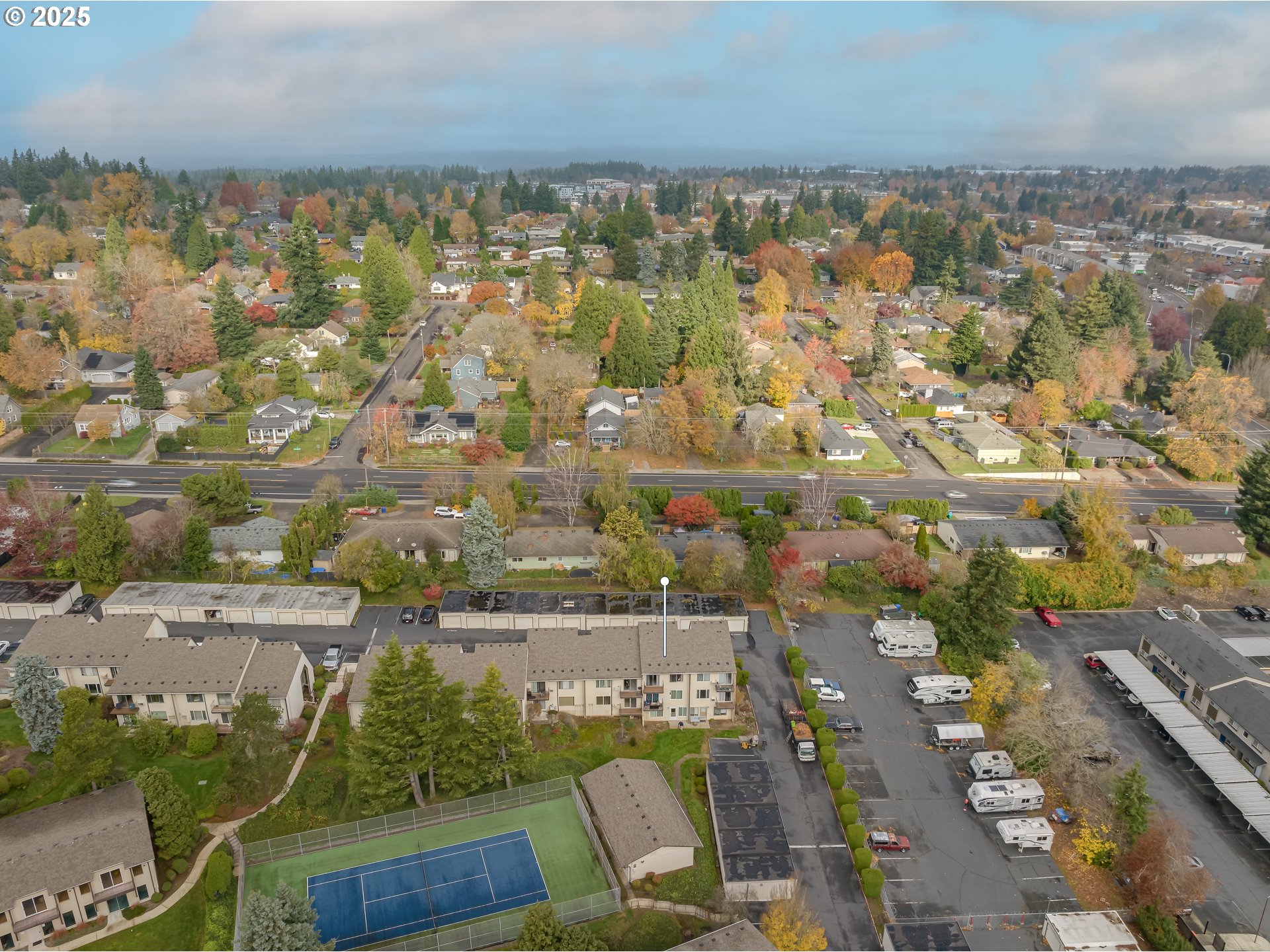 200 Southwest Florence Avenue, Unit D12 Gresham, OR 97080 - Photo 21 of 24 an aerial view of residential houses with outdoor space