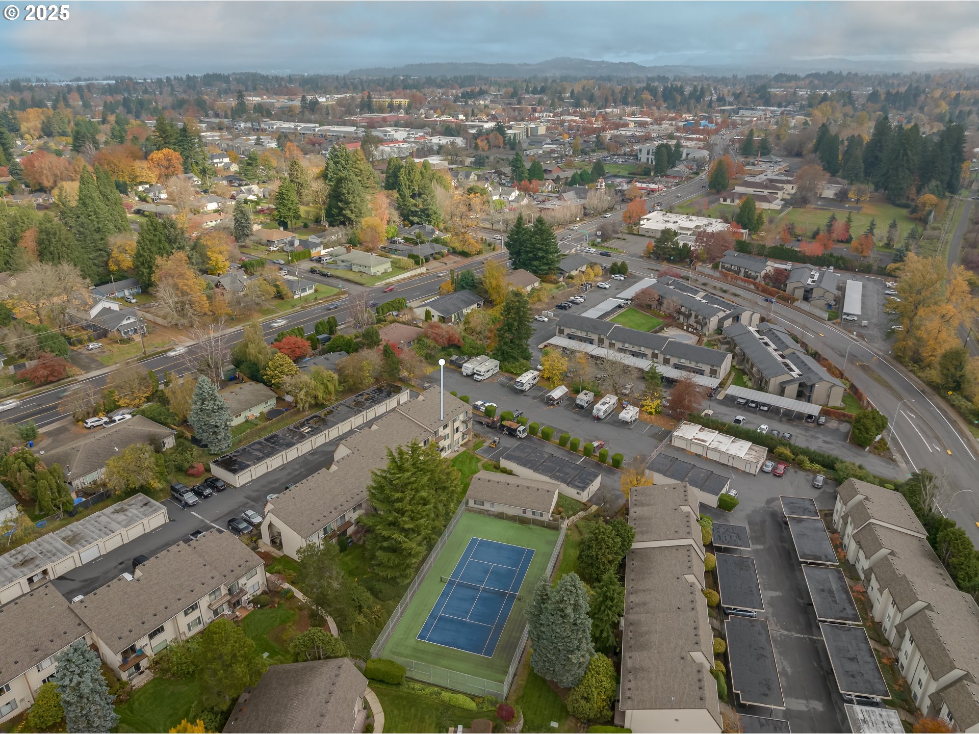200 Southwest Florence Avenue, Unit D12 Gresham, OR 97080 - Photo 22 of 24 an aerial view of residential houses with outdoor space