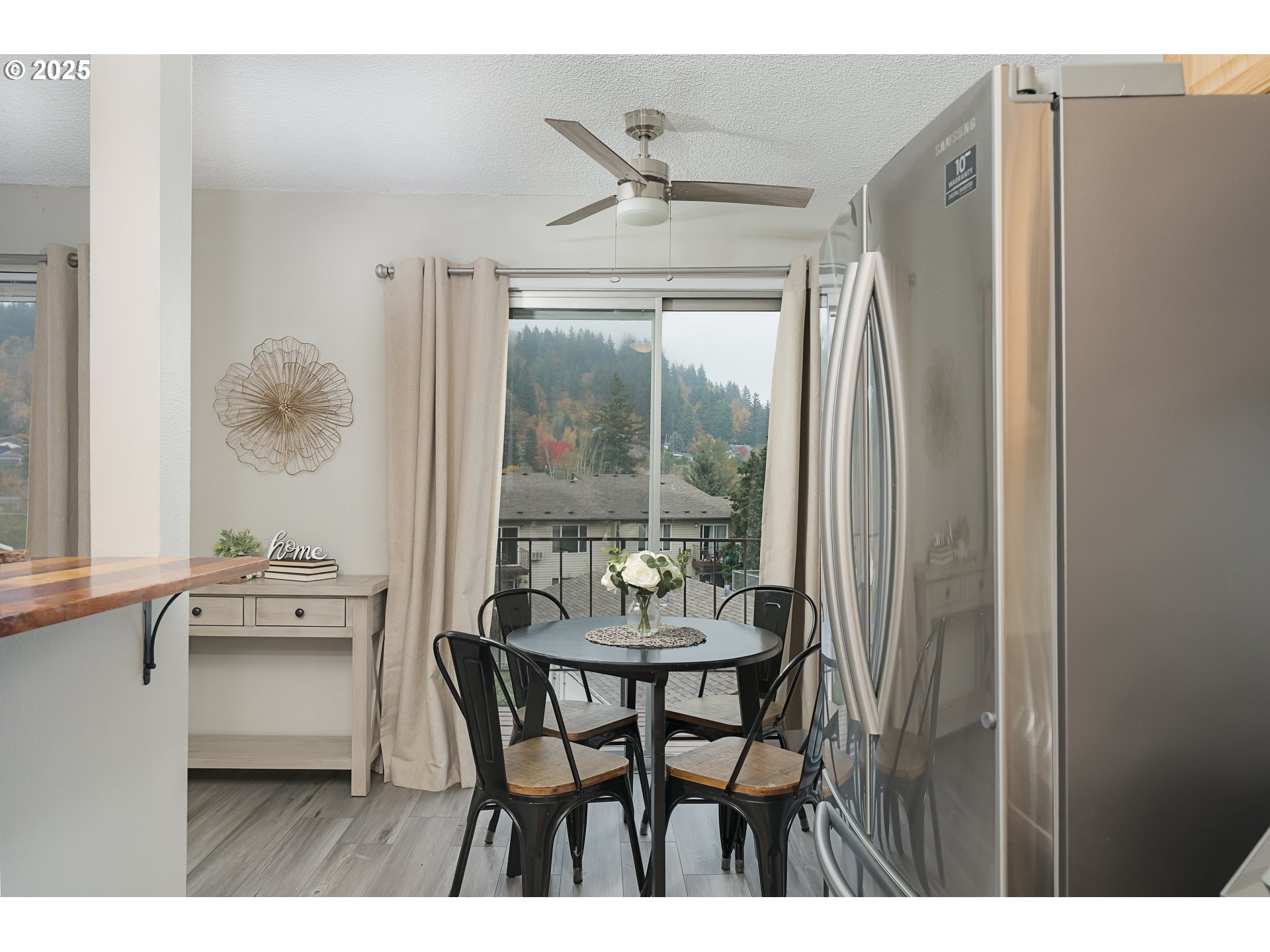 200 Southwest Florence Avenue, Unit D12 Gresham, OR 97080 - Photo 5 of 24 a dining room with furniture and window