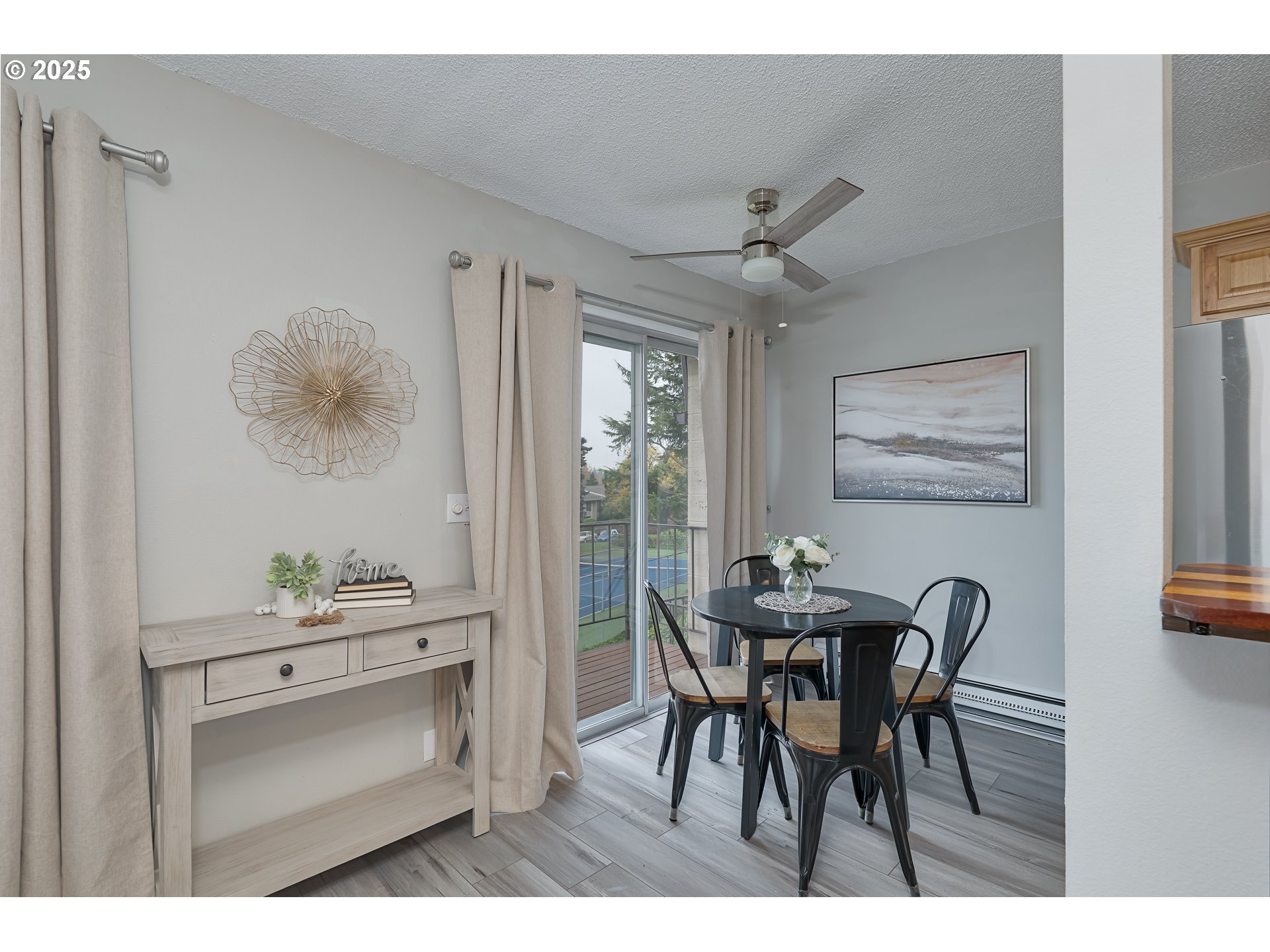 200 Southwest Florence Avenue, Unit D12 Gresham, OR 97080 - Photo 6 of 24 a dining room with furniture and window