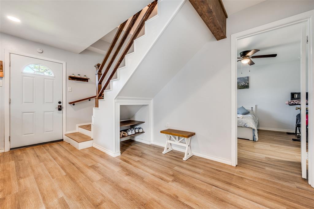 2924 West 11th Street Irving, TX 75060 - Photo 6 of 39 a view of entryway and hall with wooden floor