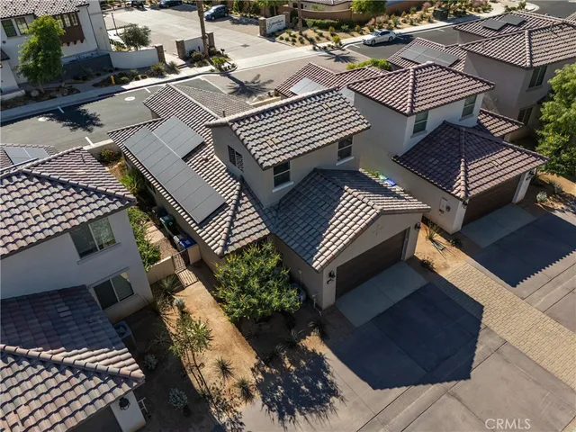 an aerial view of a city with lots of residential buildings