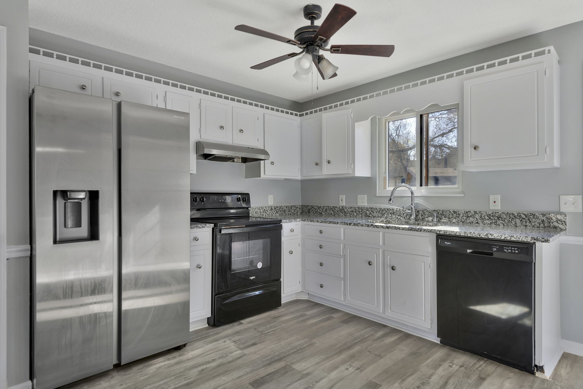 3005 Stone Bridge Road Antioch, TN 37013 - Photo 8 of 17 a kitchen with granite countertop a refrigerator and a sink