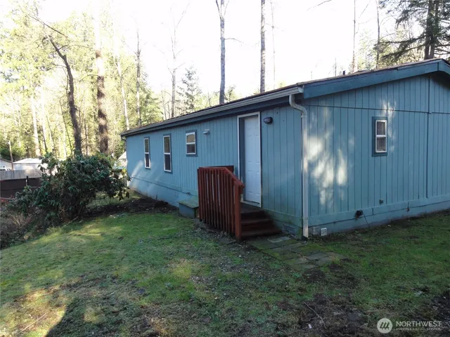 a view of a hallway with a big room