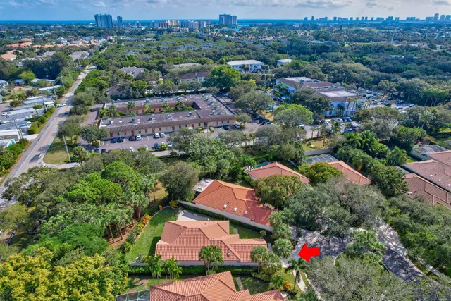 an aerial view of house with yard