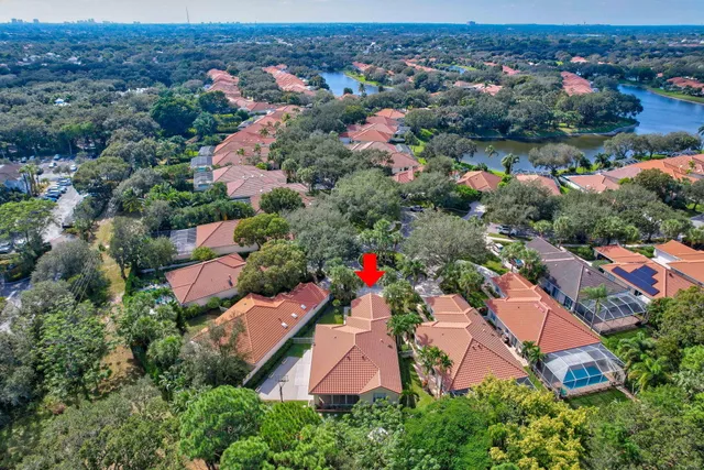 an aerial view of house with yard