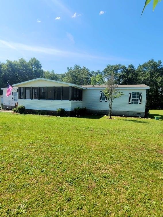 1742 Tribble Road Fort Valley, GA 31030 - Photo 1 of 1 a view of an ocean with a big yard