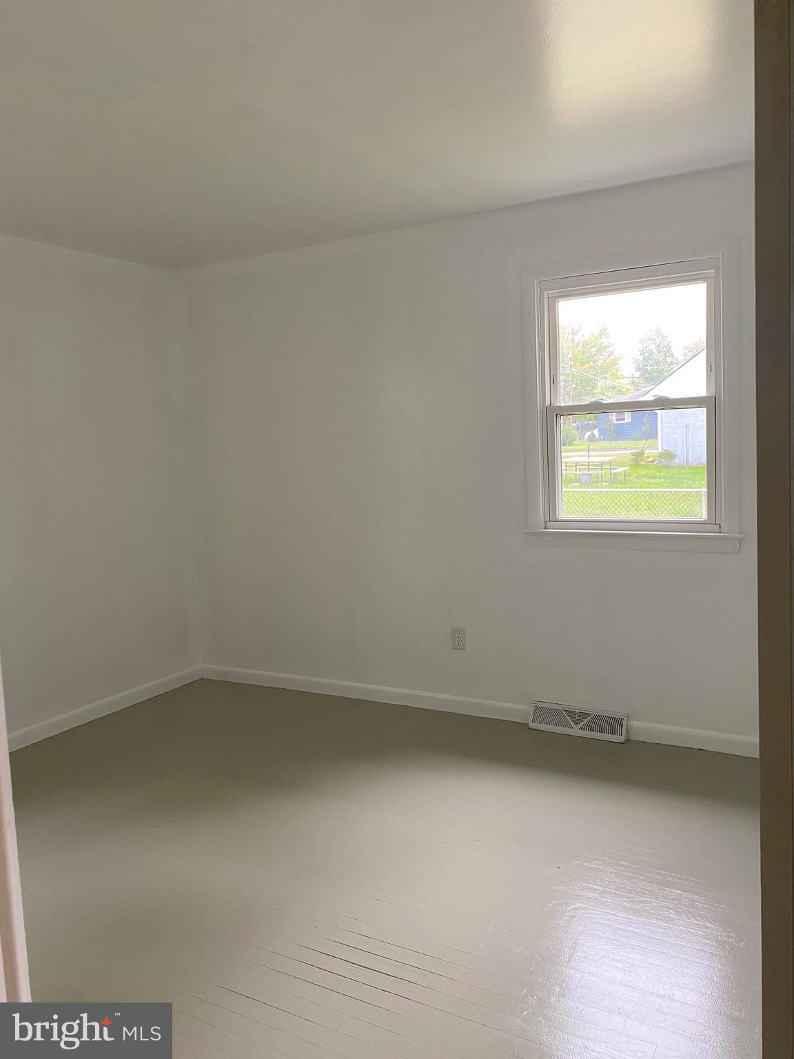 4 Riviera Drive Pennsville, NJ 08070 - Photo 11 of 22 an empty room with a window