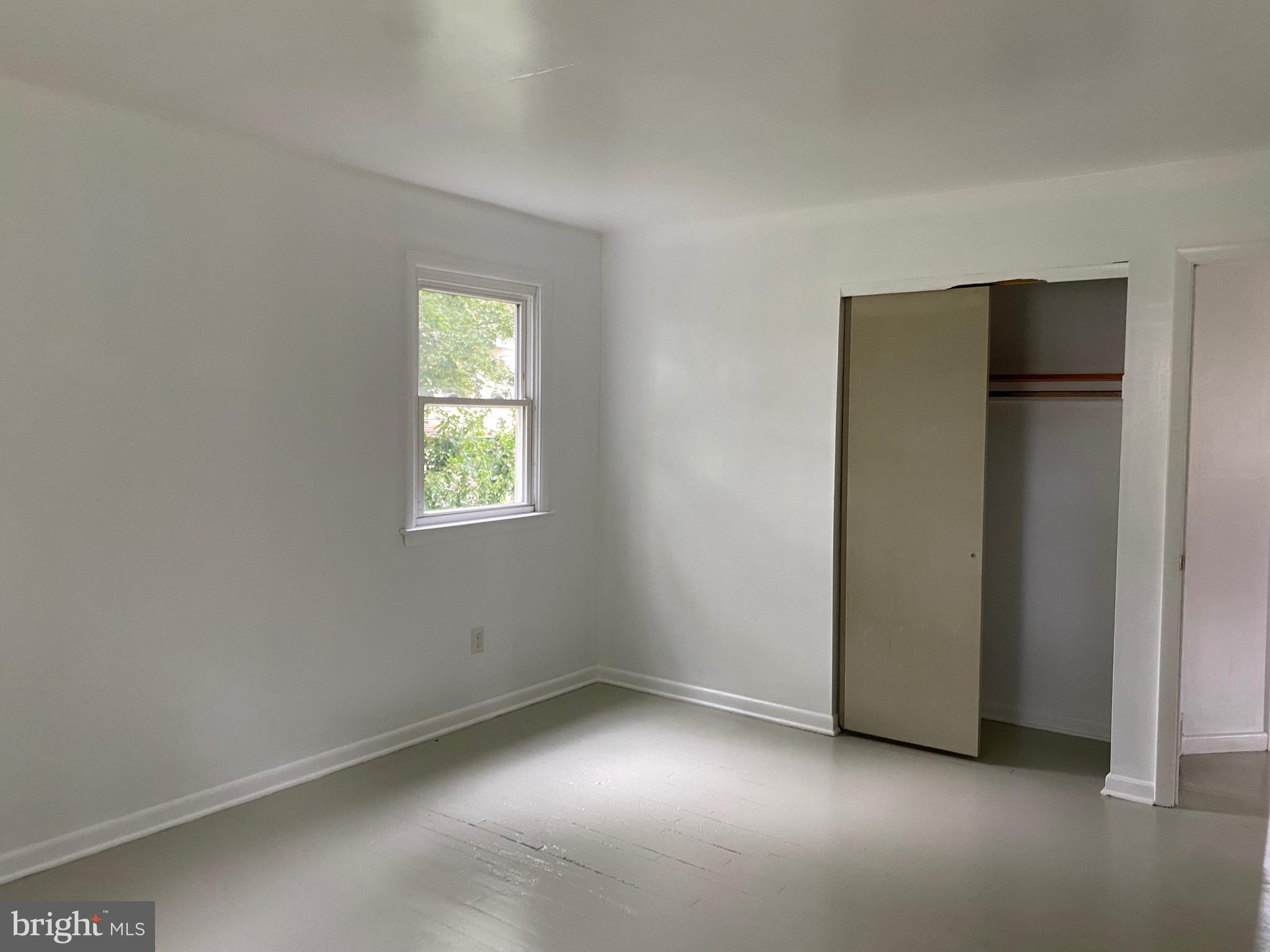 4 Riviera Drive Pennsville, NJ 08070 - Photo 14 of 22 an empty room with windows and closet