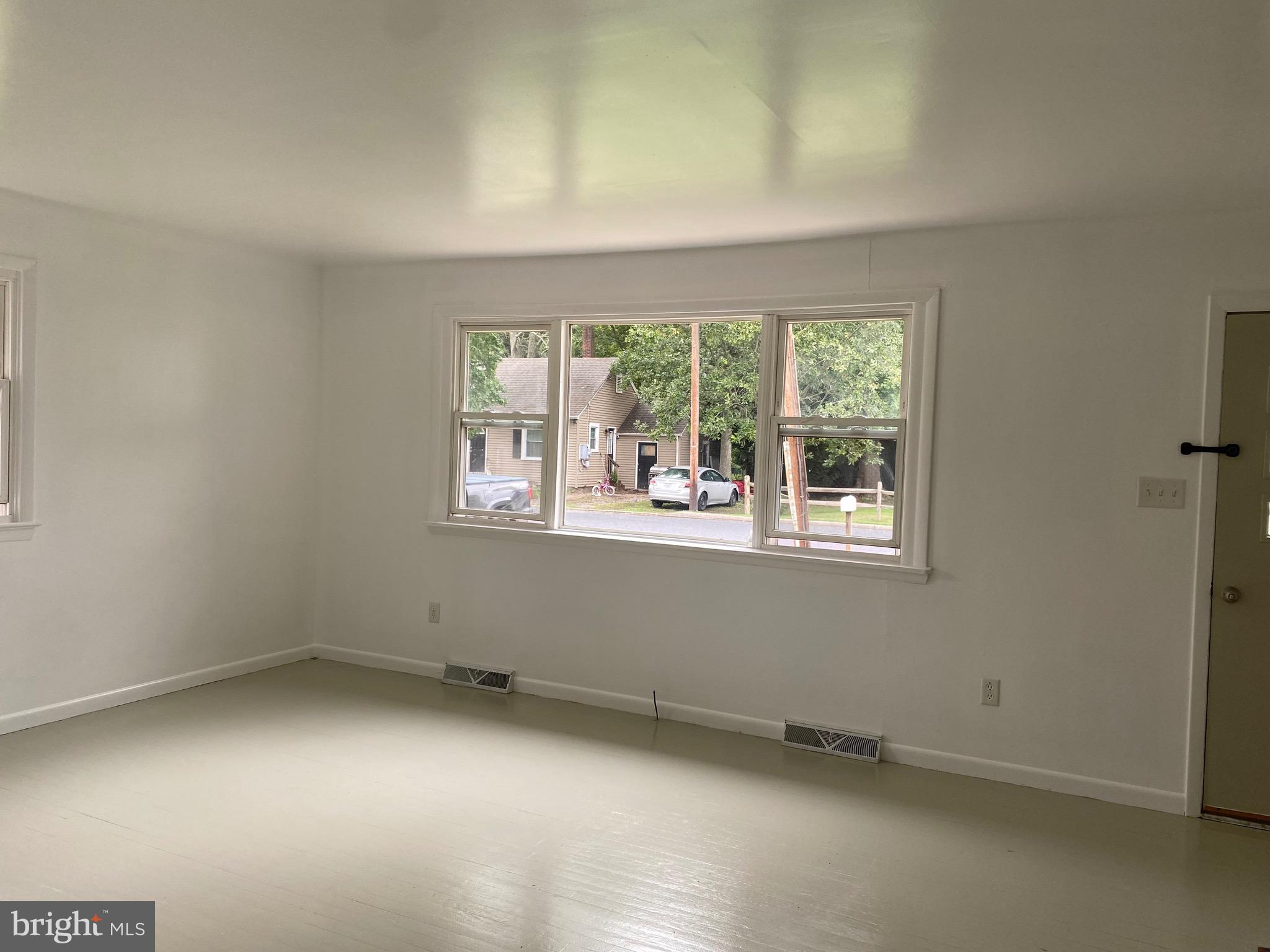 4 Riviera Drive Pennsville, NJ 08070 - Photo 15 of 22 an empty room with a window