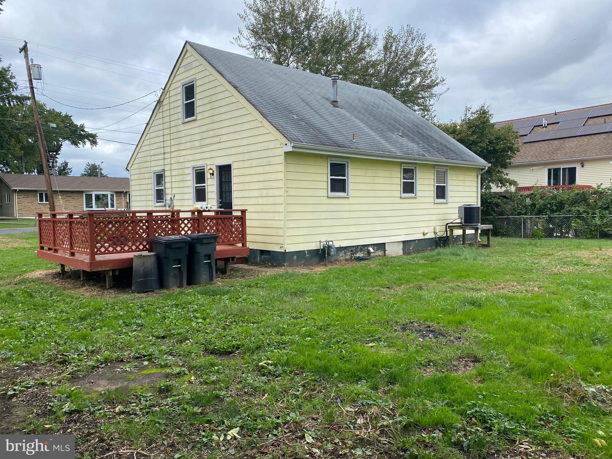 4 Riviera Drive Pennsville, NJ 08070 - Photo 2 of 22 a view of a house with a yard and sitting area